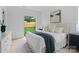 Bright bedroom with backyard view and stylish furnishings at 3822 Topsfield Rd, Charlotte, NC 28211