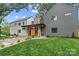 Contemporary home with a well-manicured lawn and modern architectural design at 3822 Topsfield Rd, Charlotte, NC 28211