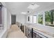 Bright hallway with natural light and modern railing at 3822 Topsfield Rd, Charlotte, NC 28211