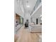 Bright living room with high ceilings, fireplace, and access to a patio at 3822 Topsfield Rd, Charlotte, NC 28211