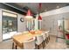 Open dining room with modern light fixtures and bright, natural light at 386 Squirrel Ln, Lake Wylie, SC 29710