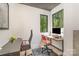 Dedicated home office area featuring natural light from wooded views, and a comfortable workstation at 386 Squirrel Ln, Lake Wylie, SC 29710