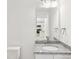 Bright bathroom space with granite countertop and a sink at 401 W Charlotte Ave, Mount Holly, NC 28120