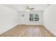 An open and airy living room with modern flooring and natural light through windows at 401 W Charlotte Ave, Mount Holly, NC 28120