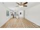 Open floor plan combines the living area with a modern kitchen and eat in area at 401 W Charlotte Ave, Mount Holly, NC 28120