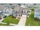 An aerial of a two-story home with a well-maintained yard and in a friendly neighborhood at 4029 Spring Garden St, Fort Mill, SC 29715