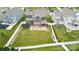 Aerial view of backyard featuring a patio, trampoline, playset, and white fence at 4029 Spring Garden St, Fort Mill, SC 29715