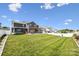 Expansive backyard with lush green lawn, privacy fence, and ample space for outdoor activities at 4029 Spring Garden St, Fort Mill, SC 29715