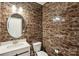 Stylish powder room with dark marble walls and white fixtures at 4029 Spring Garden St, Fort Mill, SC 29715