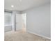 Neutral bedroom with window and carpet flooring at 4029 Spring Garden St, Fort Mill, SC 29715