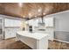 Spacious kitchen boasts a large island, stainless appliances, and bright white cabinetry at 4029 Spring Garden St, Fort Mill, SC 29715