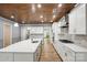 Elegant kitchen features an extended island, stainless appliances, and modern design at 4029 Spring Garden St, Fort Mill, SC 29715