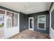 Cozy screened-in patio featuring a ceiling fan, brick-paver flooring, and outdoor access at 4029 Spring Garden St, Fort Mill, SC 29715
