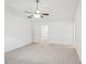 Bright, carpeted bedroom with a ceiling fan and recessed lighting at 403 W Charlotte Ave, Mount Holly, NC 28120