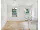 An ample dining area showcasing modern lighting fixtures and natural light at 403 W Charlotte Ave, Mount Holly, NC 28120