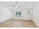 Inviting living area filled with natural light, complemented by sleek flooring and a stylish ceiling fan at 403 W Charlotte Ave, Mount Holly, NC 28120