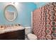 Bright bathroom with granite counters, vanity, and brown shower curtain at 4612 Saxonbury Way, Charlotte, NC 28269