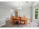 Comfortable dining space featuring a wood table and bright window views at 4612 Saxonbury Way, Charlotte, NC 28269