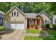 Charming home featuring a two-car garage and manicured landscaping at 4612 Saxonbury Way, Charlotte, NC 28269