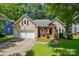 Charming home featuring a two-car garage and manicured landscaping at 4612 Saxonbury Way, Charlotte, NC 28269