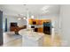 Open kitchen features granite countertops, a breakfast bar, and modern appliances at 4612 Saxonbury Way, Charlotte, NC 28269
