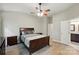 Bedroom featuring wood-look floors and a ceiling fan with lights at 4612 Saxonbury Way, Charlotte, NC 28269