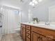 Bathroom featuring a double sink vanity, a bathtub, and updated fixtures at 5005 Hedgebrook Ln, Waxhaw, NC 28173