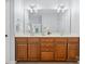 Bathroom featuring a double sink vanity, a large mirror and updated fixtures at 5005 Hedgebrook Ln, Waxhaw, NC 28173