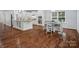 Open-concept kitchen featuring an island, granite countertops, and stainless steel appliances at 5005 Hedgebrook Ln, Waxhaw, NC 28173