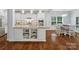 Charming kitchen featuring an island with granite countertops and custom white cabinets, perfect for cooking and entertaining at 5005 Hedgebrook Ln, Waxhaw, NC 28173
