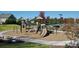 Community playground featuring climbing wall, slides, and swings at 5005 Hedgebrook Ln, Waxhaw, NC 28173