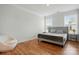 Bright bedroom with hardwood floors, neutral color palette, and ample natural light at 5114 Whispy Vines Ln, Huntersville, NC 28078