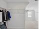 Walk-in closet with ample storage and a view of the bedroom at 5114 Whispy Vines Ln, Huntersville, NC 28078
