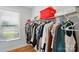 Walk-in closet with ample storage and shelving, perfect for organizing your wardrobe at 5114 Whispy Vines Ln, Huntersville, NC 28078