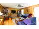 Spacious living room featuring hardwood floors and wood paneling, creating a warm and inviting atmosphere at 517 Powell St, Rock Hill, SC 29732