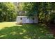 Exterior view of storage building featuring siding and windows on a well manicured lawn at 517 Powell St, Rock Hill, SC 29732