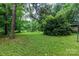Expansive backyard featuring lush greenery and natural landscaping for outdoor enjoyment at 661 Blackwelder Rd, Statesville, NC 28625