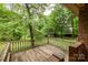 Enjoy the outdoors from this deck overlooking a green backyard with a wooden shed at 661 Blackwelder Rd, Statesville, NC 28625