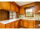 Functional kitchen with retro design and wood cabinetry, offering a practical cooking space at 661 Blackwelder Rd, Statesville, NC 28625