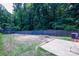Expansive backyard featuring a wooden fence offering ample room for outdoor activities and entertaining at 6919 Ware Rd, Charlotte, NC 28212