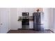 Well-equipped kitchen featuring stainless steel appliances and ample counter space on white cabinets at 6919 Ware Rd, Charlotte, NC 28212