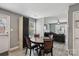 Cozy dining area with wood table, modern flooring, and ample natural light at 719 Dawn Cir, Charlotte, NC 28213