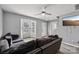 Living room with a large window, gray walls, and stylish flooring at 719 Dawn Cir, Charlotte, NC 28213