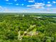 Nice community view from the air, pool, homes and woods at 815 Lakeside Cir, Lancaster, SC 29720