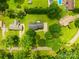 Spacious backyard with lush greenery, mature trees and neighborhood view at 815 Lakeside Cir, Lancaster, SC 29720