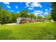 Spacious backyard featuring a lush lawn, perfect for outdoor activities and entertaining at 815 Lakeside Cir, Lancaster, SC 29720