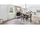 Charming dining room with wood floors and views of the kitchen, perfect for entertaining at 815 Lakeside Cir, Lancaster, SC 29720