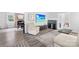 Cozy living room with wood floors, fireplace, and comfortable seating at 815 Lakeside Cir, Lancaster, SC 29720