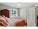 Bright bedroom with large window, carpet and a ceiling fan at 820 Settlement St, Clover, SC 29710