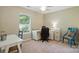 Versatile bedroom space with a desk, chair, and window view, ideal for a home office or study area at 820 Settlement St, Clover, SC 29710